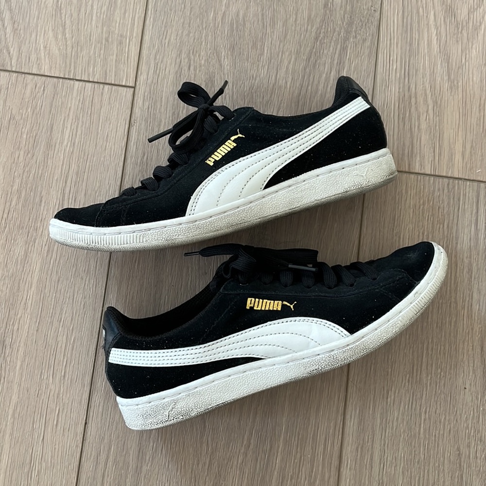 Puma size 7.5 black suede with white stripe